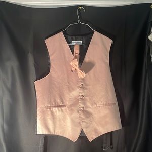 Pink and black vest with a pink bow Tie